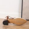 Newness Two Tone Pointed Toe Heels in brown These chic heels feature a chunky mid heel cut out design and brown cover straps Perfect for any occasion