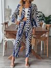 Stylish woman wearing a chic geometric print two piece set perfect for summer and fall The outfit features a flattering silhouette and vibrant print