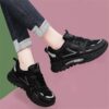 Newness Cityscape Casual Sport Sneakers showcasing all season comfort and a chic modern design The sneakers are shown on a models feet highlighting the style and detailing