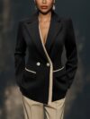 Sophisticated white double breasted womens blazer with asymmetrical hem long sleeves and high quality polyester fabric perfect for professional settings