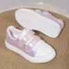 Adorable girls pink glitter sneakers perfect for everyday wear These low top casual shoes offer comfort durability and a touch of sparkle