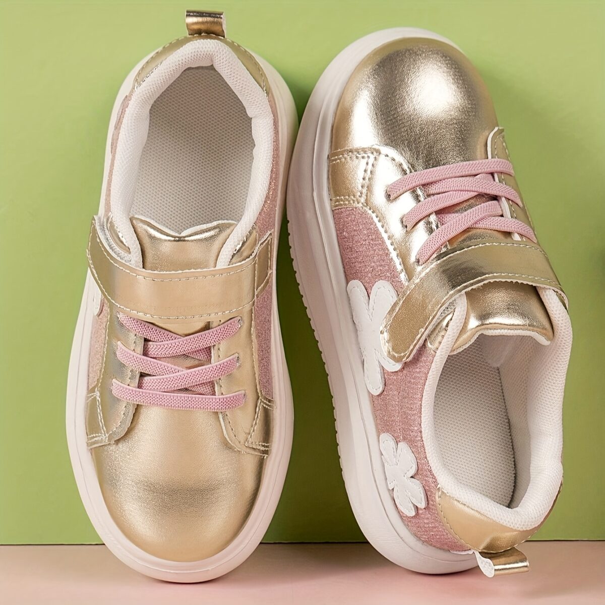 Adorable girls pink and white floral sneakers perfect for play or everyday wear Twinkle Toes brand