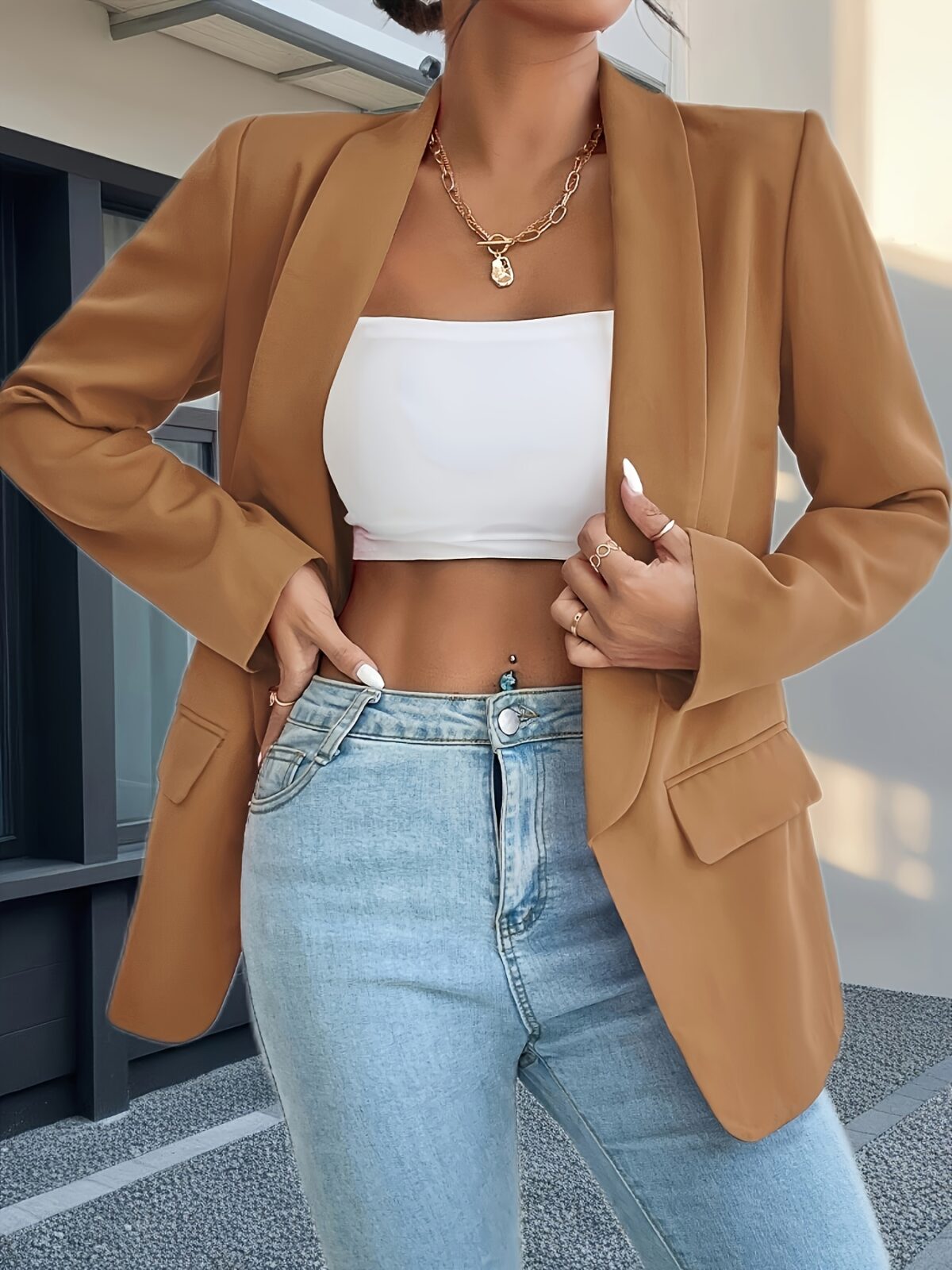 Corporate Chic Womens Solid Color Lapel Collar Blazer in versatile navy blue ideal for the office semi formal events or casual wear Features a flattering lapel collar and is made from durable easy care polyester