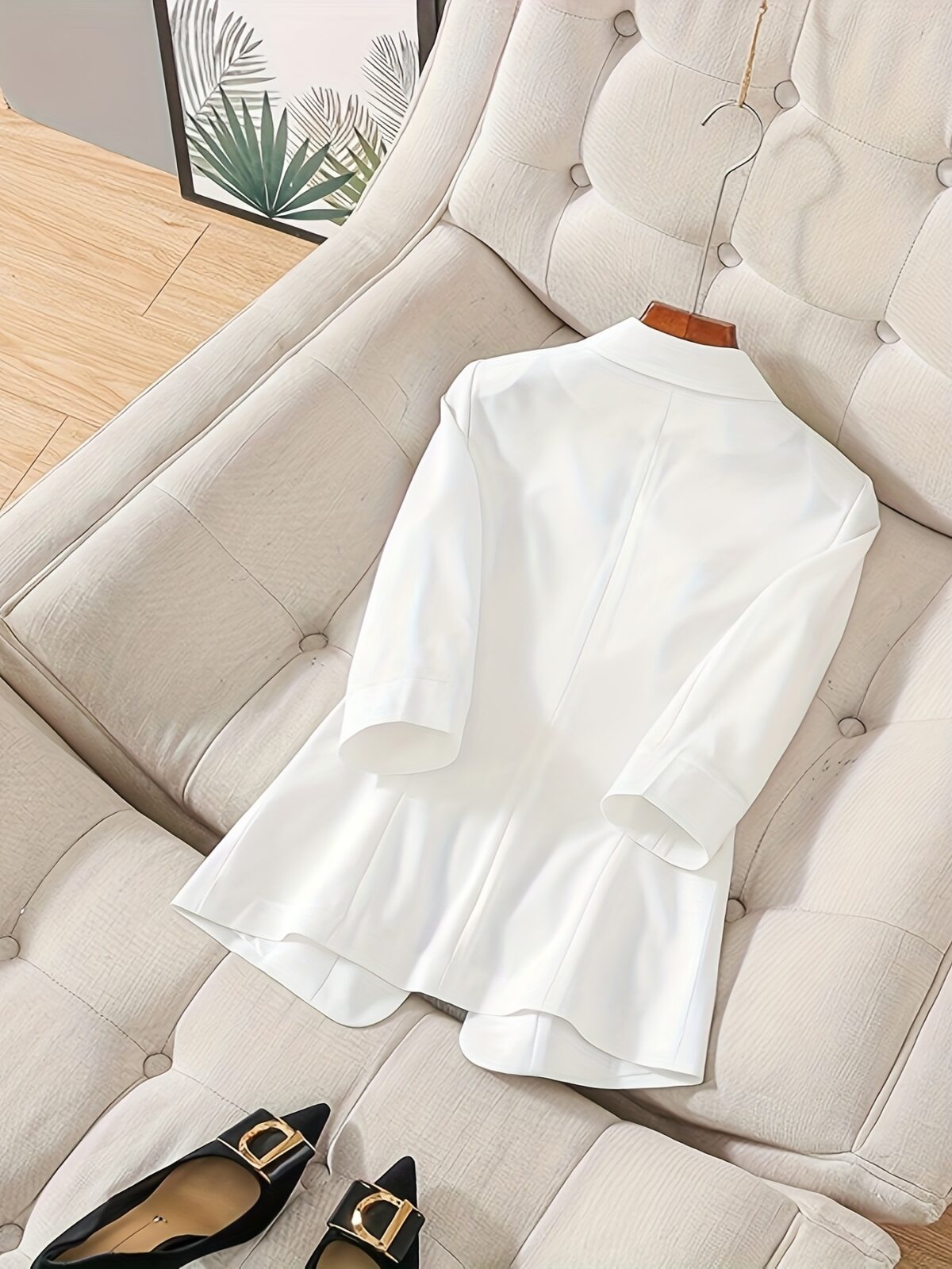 Womens elegant white blazer perfect for spring and summer offering a chic and comfortable fit Versatile jacket to elevate your style