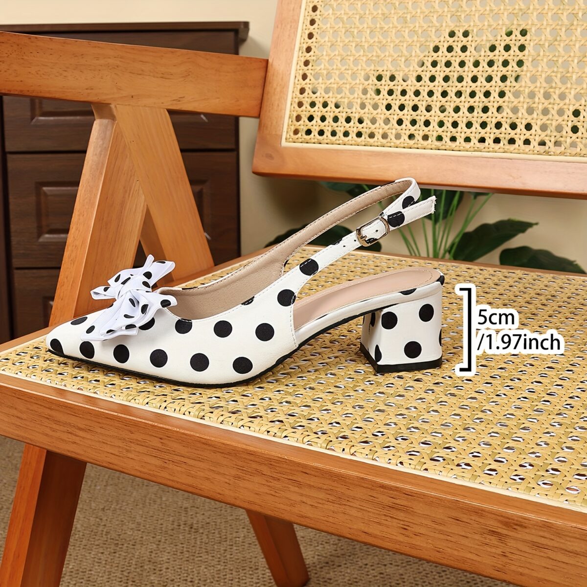 Classic black and white polka dot pumps from Newness perfect for adding a retro touch to any outfit