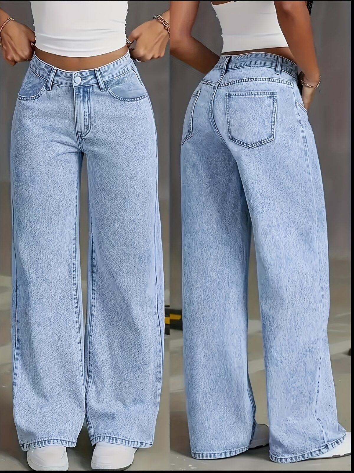 Model wearing Newness Dubai Breeze Wide Leg Jeans a light wash high waisted pair of wide leg jeans