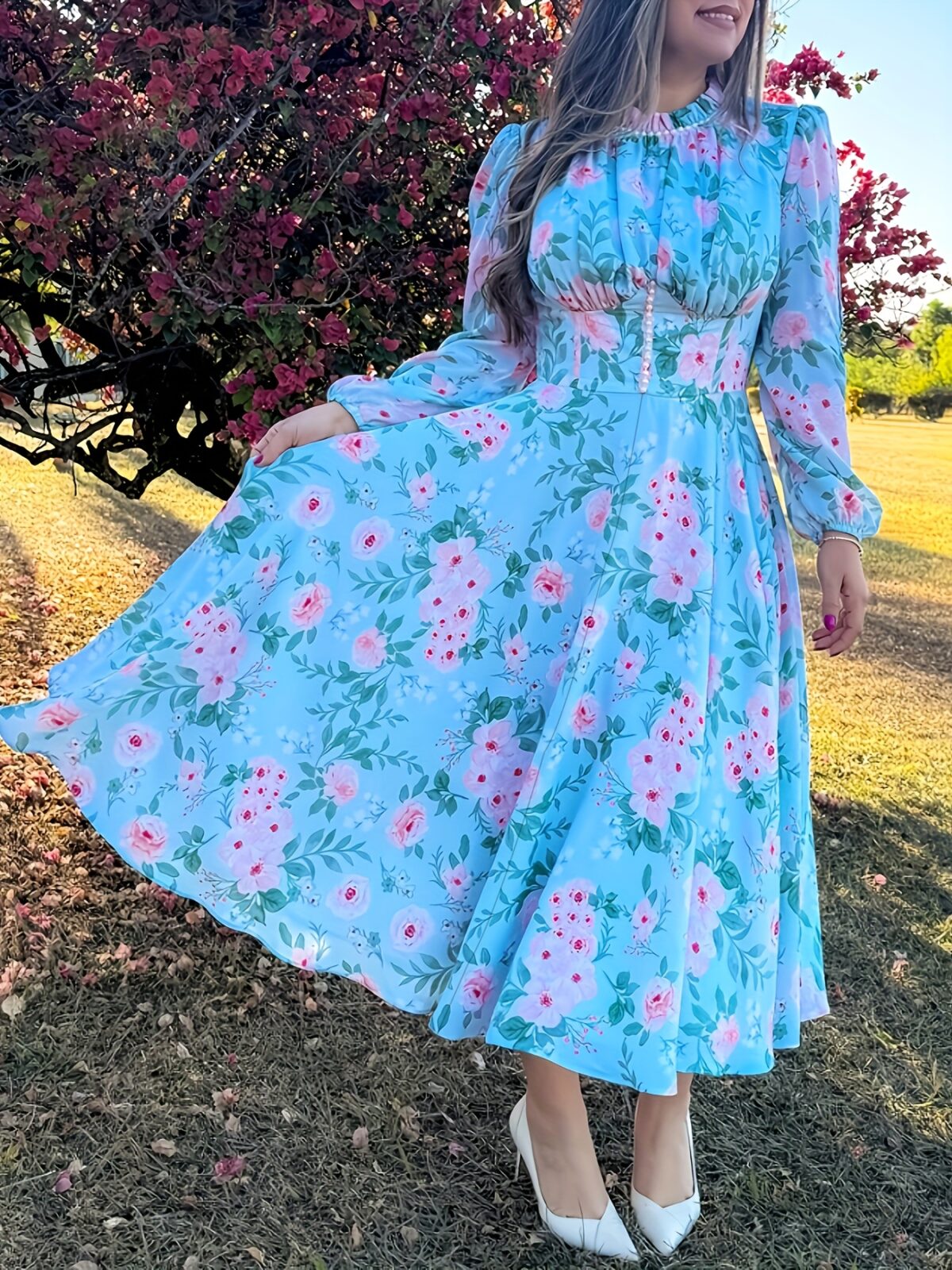 Embrace Parisian chic in the Newness Azure Bloom Floral Print Dress This stunning summer dress features a vibrant floral print