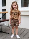 Adorable little girls summer outfit featuring a chic leopard print and a playful Daddys Girl graphic