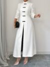 Flattering Timeless Chic Womens Stand Collar Tunic in versatile 100 polyester Featuring a chic stand collar and contrast button details this tunic offers elegance and comfort for all seasons