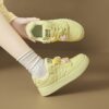 Newness Pastel Dream Low Top Sneakers in soft pastel shades showcasing their comfortable design and stylish appeal