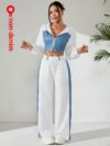 Skyline Chic Two Piece Set Flatlay of a stylish zip up hoodie and wide leg pants in a complementary color scheme Perfect for spring or fall