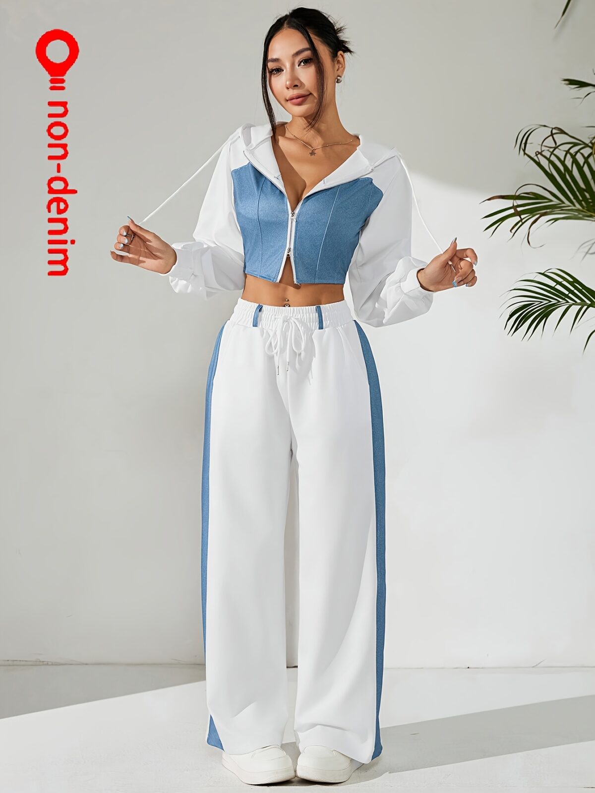Skyline Chic Two Piece Set Flatlay of a stylish zip up hoodie and wide leg pants in a complementary color scheme Perfect for spring or fall