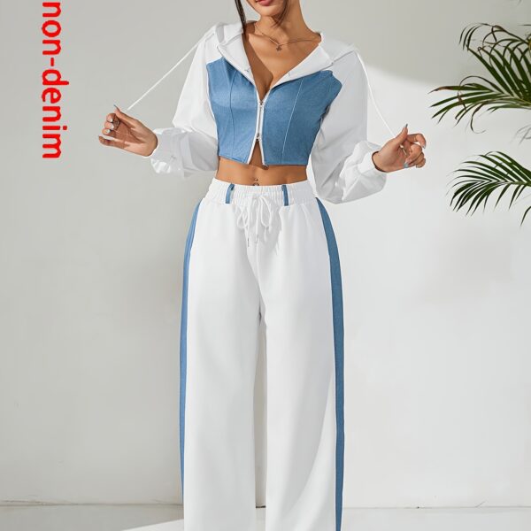 Skyline Chic Two-Piece Set: Flatlay of a stylish zip-up hoodie and wide-leg pants in a complementary color scheme. Perfect for spring or fall.