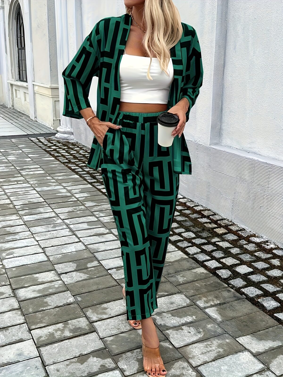 The Newness Modern Muse Geometric Print Set a chic two piece outfit featuring a modern geometric print perfect for any occasion