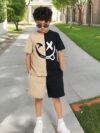 Adorable boy wearing a trendy color block set perfect for playtime school or any casual occasion The outfit features vibrant colors and a comfortable soft fabric