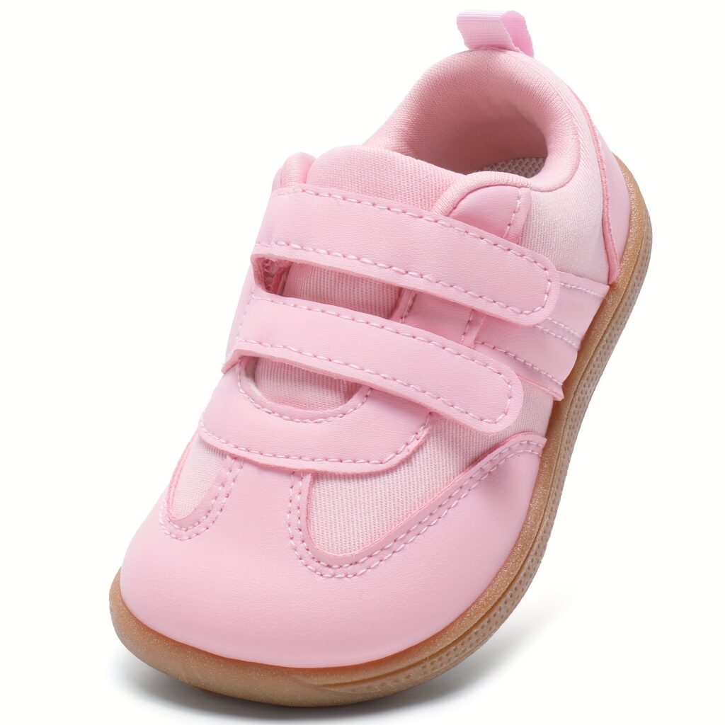 Adorable pink toddler girl sneakers with a wide toe box, perfect for all-season wear. Featuring a non-slip sole, breathable fabric, and cushioned insole for ultimate comfort and support.