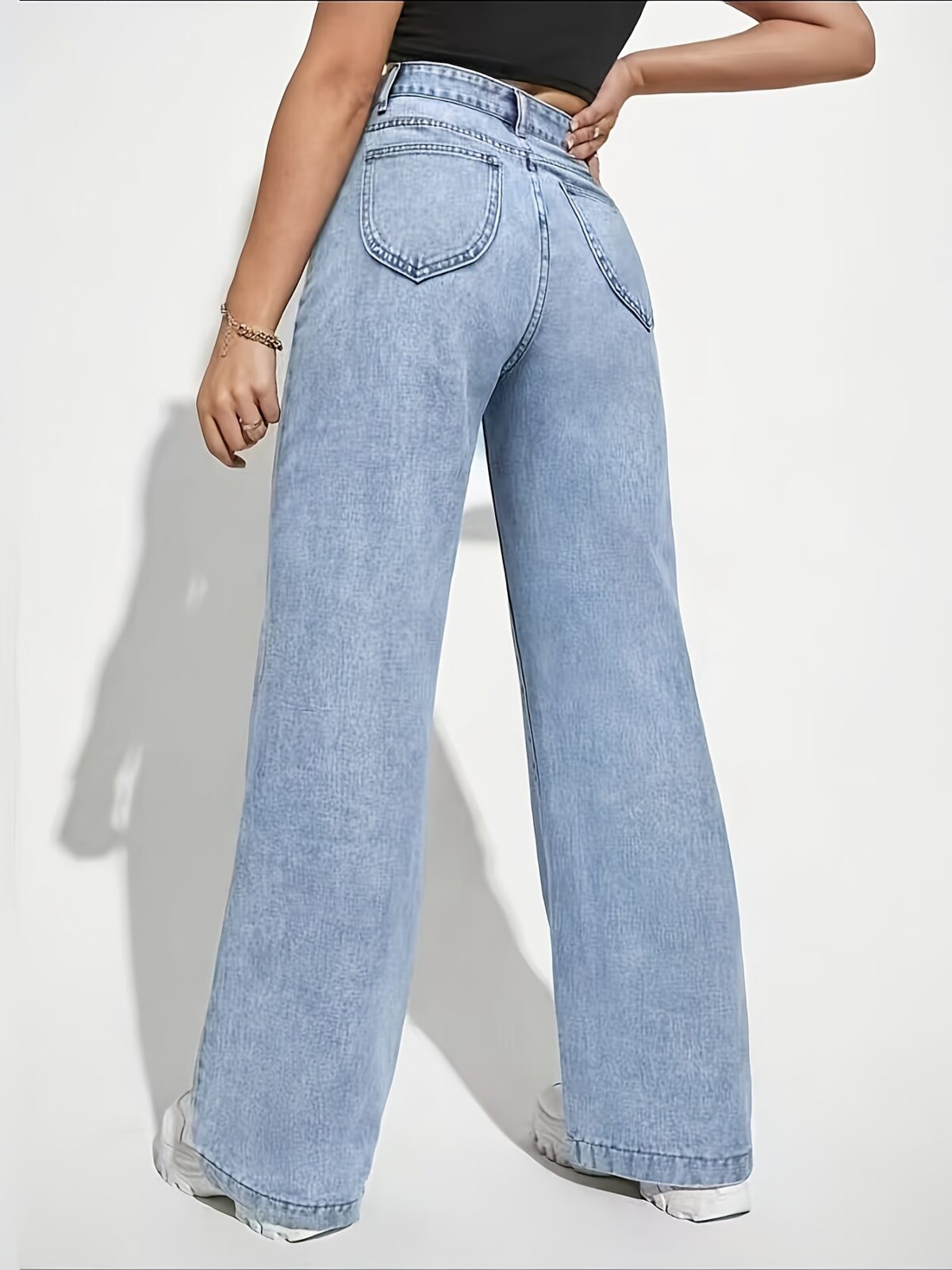Effortless Chic High Waisted Wide Leg Jeans by Newness Flattering wide leg silhouette high waisted design comfortable fit Perfect for any occasion