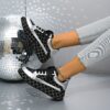 Newness Nova Sparkle Rhinestone Platform Sneakers in white showcasing the dazzling rhinestone detailing and chunky platform sole The sneakers are styled on a models feet emphasizing their comfort and chic design