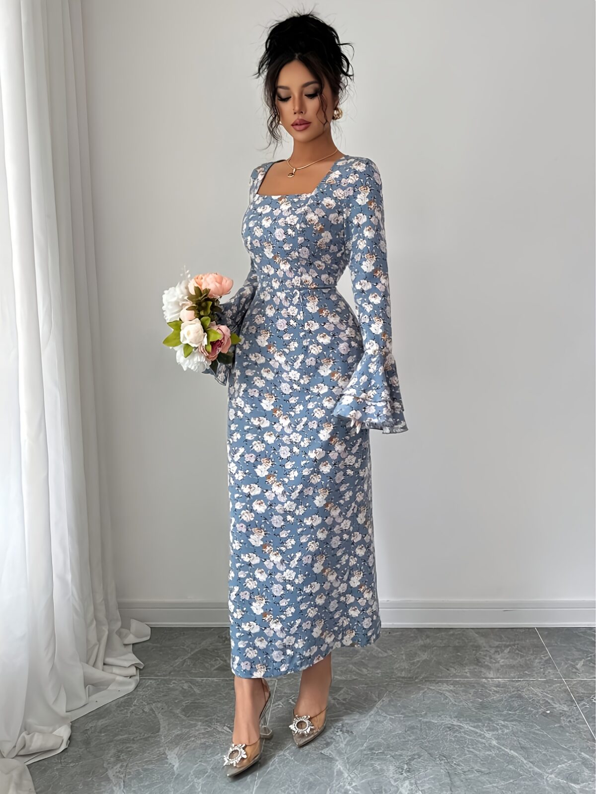 The Newness Casablanca Floral Print Maxi Dress a stunning floor length dress adorned with a vibrant floral print perfect for any occasion
