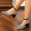 Newness Parisian Chic Houndstooth Block Heels Elevate your style with these comfortable and chic black and white houndstooth block heels perfect for any occasion