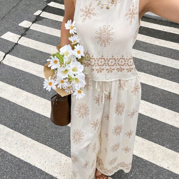 Effortlessly chic Casablanca Floral Print Set from Newness a luxurious two piece outfit in a vibrant floral print crafted from a rayon and polyester blend