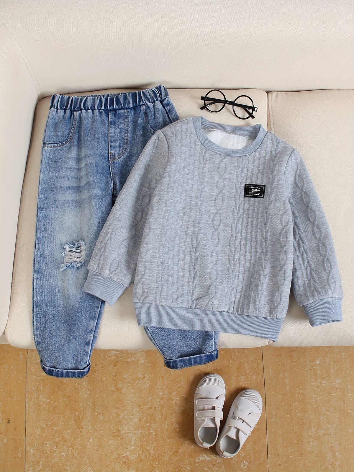 Stylish boys outfit long sleeve solid color top and ripped faux denim jeans perfect for spring and fall