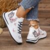Newness Bloomsbury Floral Print Sneakers Chic and comfortable floral print sneakers perfect for any season View the stylish design