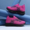 Adorable girls pink butterfly knit sneakers perfect for all season wear Featuring a comfy knit design and embroidered cartoon butterflies these shoes are ideal for running hiking and casual outings