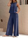 The Newness Cairo Sleeveless Wide Leg Set in white featuring a relaxed sleeveless top and wide leg pants perfect for a spring or summer day