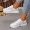 Newness City Chic White Zipper Sneakers Elevate your style with these chic and comfortable white sneakers perfect for any occasion