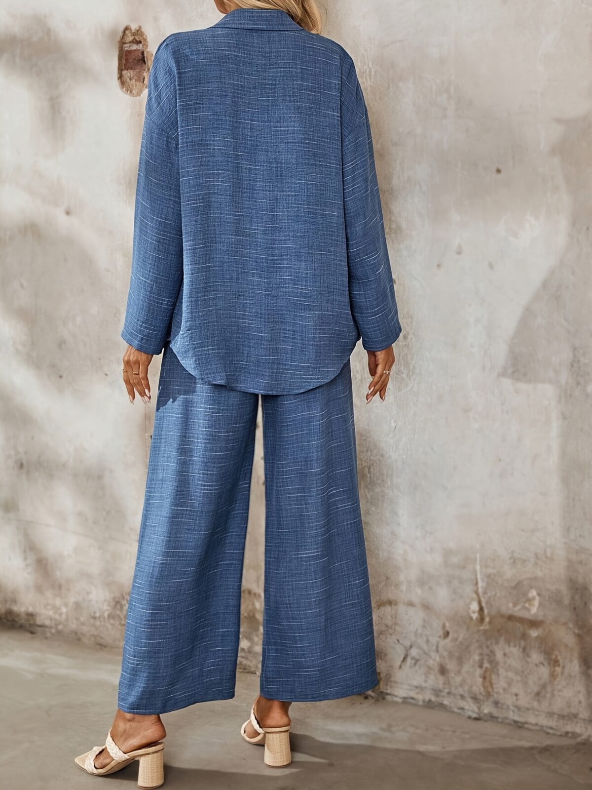 The Newness Dubai Chic Two Piece Pant Set in a flattering modern design perfect for spring or fall A stylish woman confidently wears the matching pants and top