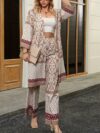 Model showcasing the Newness Dubai Nights Digital Print Suit a chic and sophisticated digital print suit ideal for spring and fall The suit features a flattering silhouette and vibrant print
