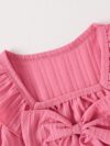 Adorable girls two piece outfit in breathable fabric featuring a charming bow detail and stylish wide leg pants perfect for autumn outings