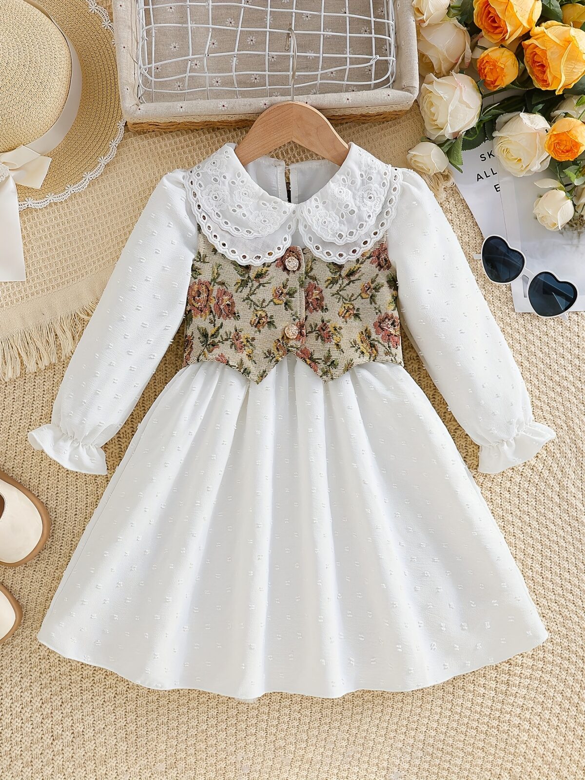 Newness Kensington Jacquard Floral Dress A chic and elegant floral dress perfect for spring Close up view showing the intricate jacquard fabric and flattering silhouette