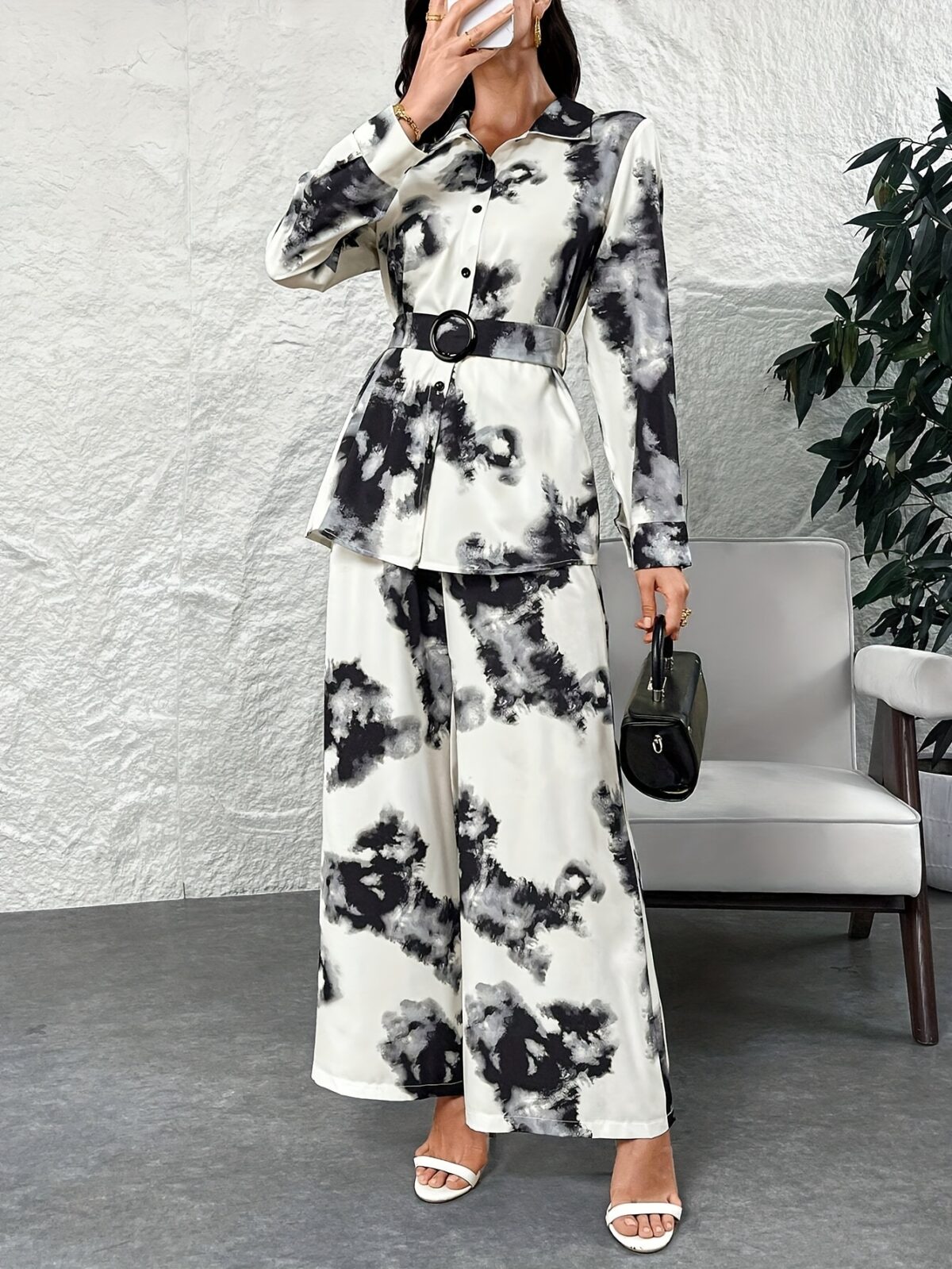 Newness Casablanca Tie Dye Two Piece Set Chic and sophisticated tie dye two piece outfit perfect for fall Features a stylish top and matching bottoms in a trendy dye pattern