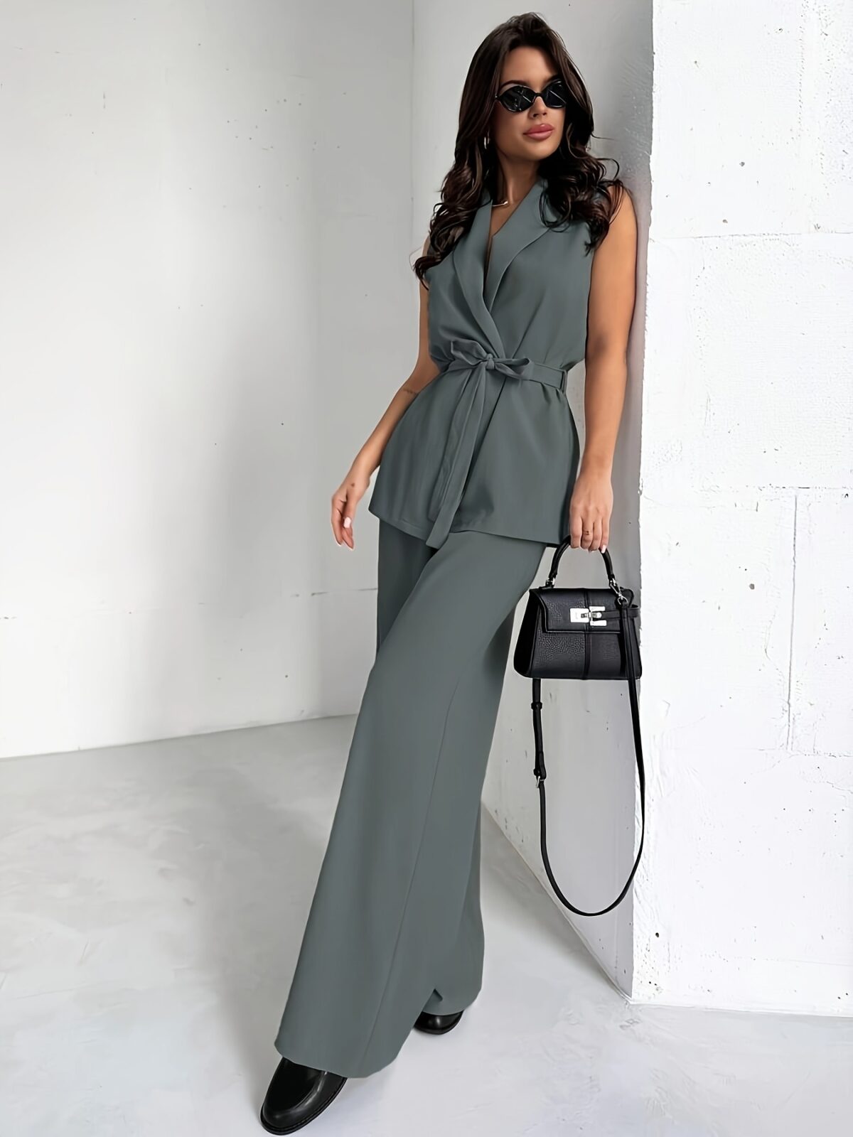 Model wearing the Newness Dubai Breeze Elegant Wide Leg Set a stylish two piece outfit featuring wide leg pants and a coordinating top perfect for any occasion