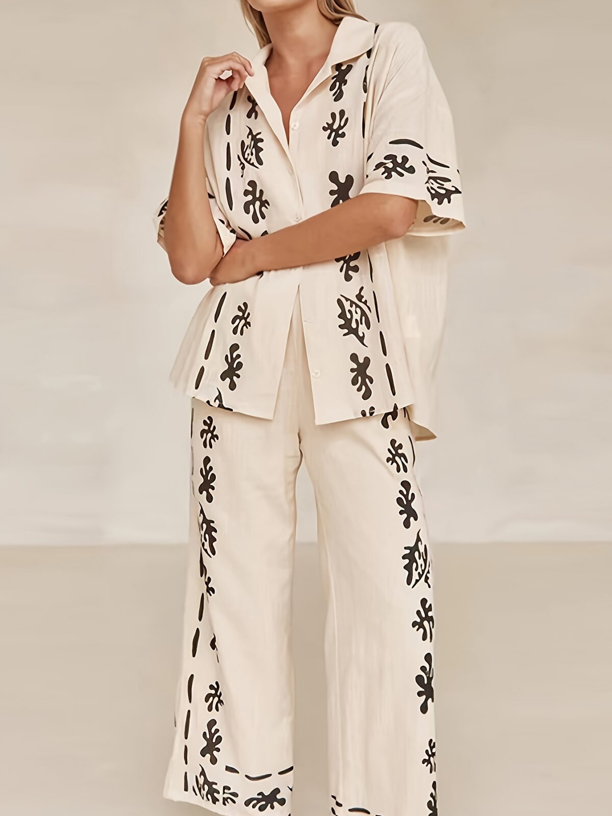 Effortlessly chic Botanical Breeze Floral Print Set from Newness A soft polyester blend creates a relaxed all season outfit Flattering floral print