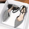 Newness Parisian Chic Houndstooth Block Heels Elevate your style with these comfortable and chic black and white houndstooth block heels perfect for any occasion