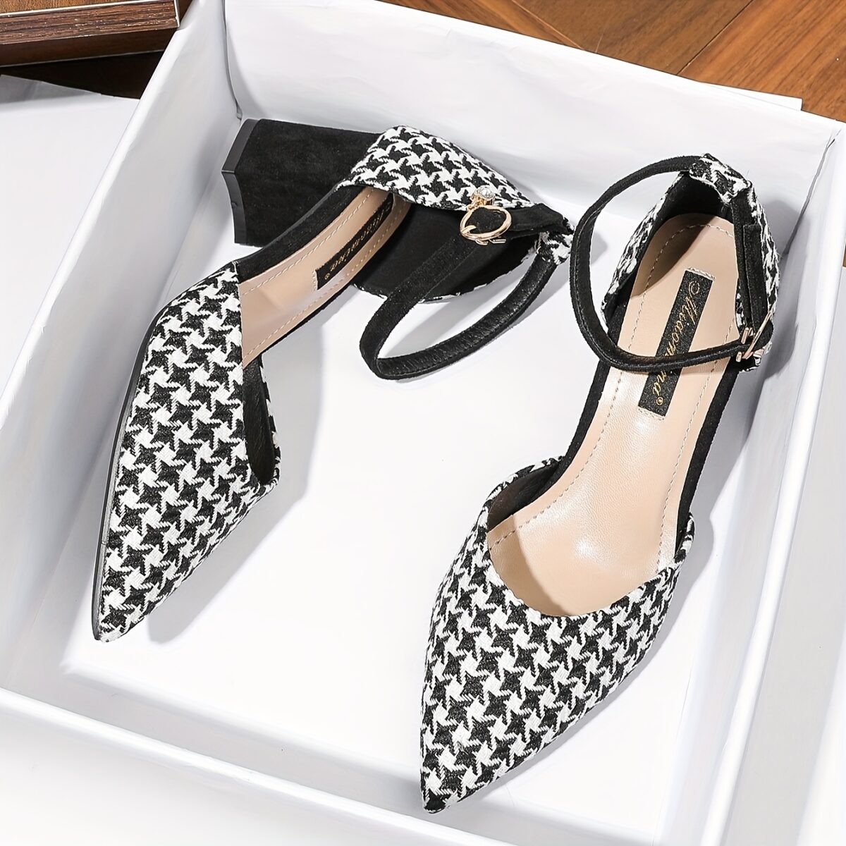 Newness Parisian Chic Houndstooth Block Heels Elevate your style with these comfortable and chic black and white houndstooth block heels perfect for any occasion