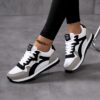 Newness City Stroll Striped Casual Sneakers Effortlessly stylish striped sneakers perfect for all day wear Image shows the sneakers from a side angle highlighting their comfortable design and vibrant stripes