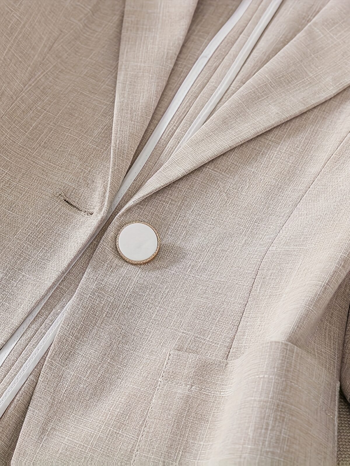 Womens elegant white blazer perfect for spring and summer offering a chic and comfortable fit Versatile jacket to elevate your style