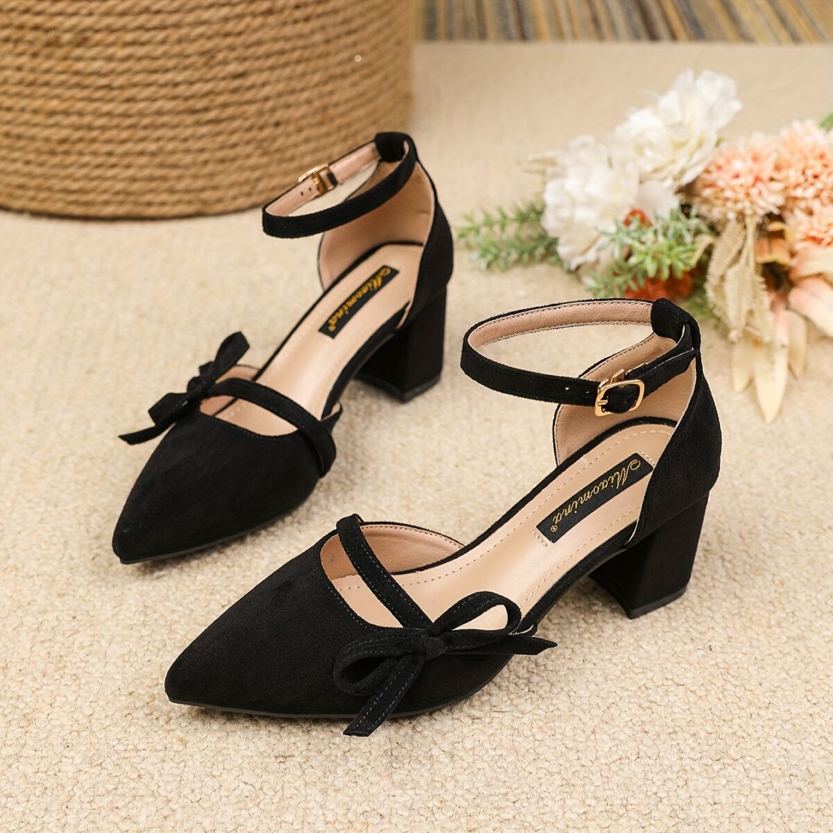 Newness Bow Detail Pointed Toe Pumps Chic wide width heels in black featuring a delicate bow mid block heel and durable rubber sole perfect for both casual and formal wear