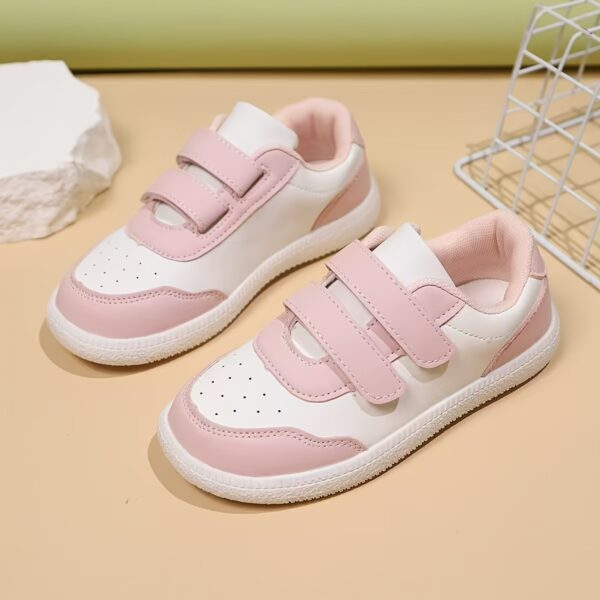 Youthful Stride Kids' Breathable Sneakers in action, showcasing their comfort and style with adjustable straps and breathable design. A child's foot is shown wearing the shoe, highlighting the breathable upper and TPR sole.