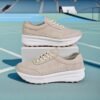 Newness Womens Elevated Edge Platform Sneakers Comfortable breathable and stylish platform sneakers in white showcasing the platform sole and breathable fabric