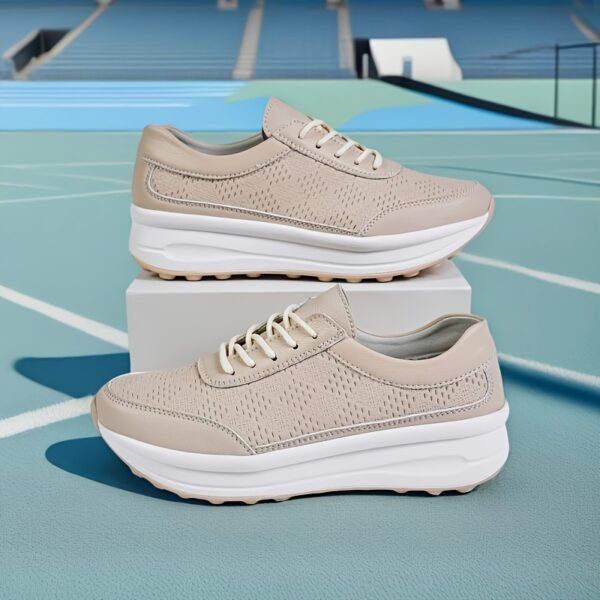 Newness Womens Elevated Edge Platform Sneakers Comfortable breathable and stylish platform sneakers in white showcasing the platform sole and breathable fabric