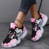 Newness Dark Bloom Skull Print Sneakers Edgy chic sneakers with a skull print perfect for elevating any look