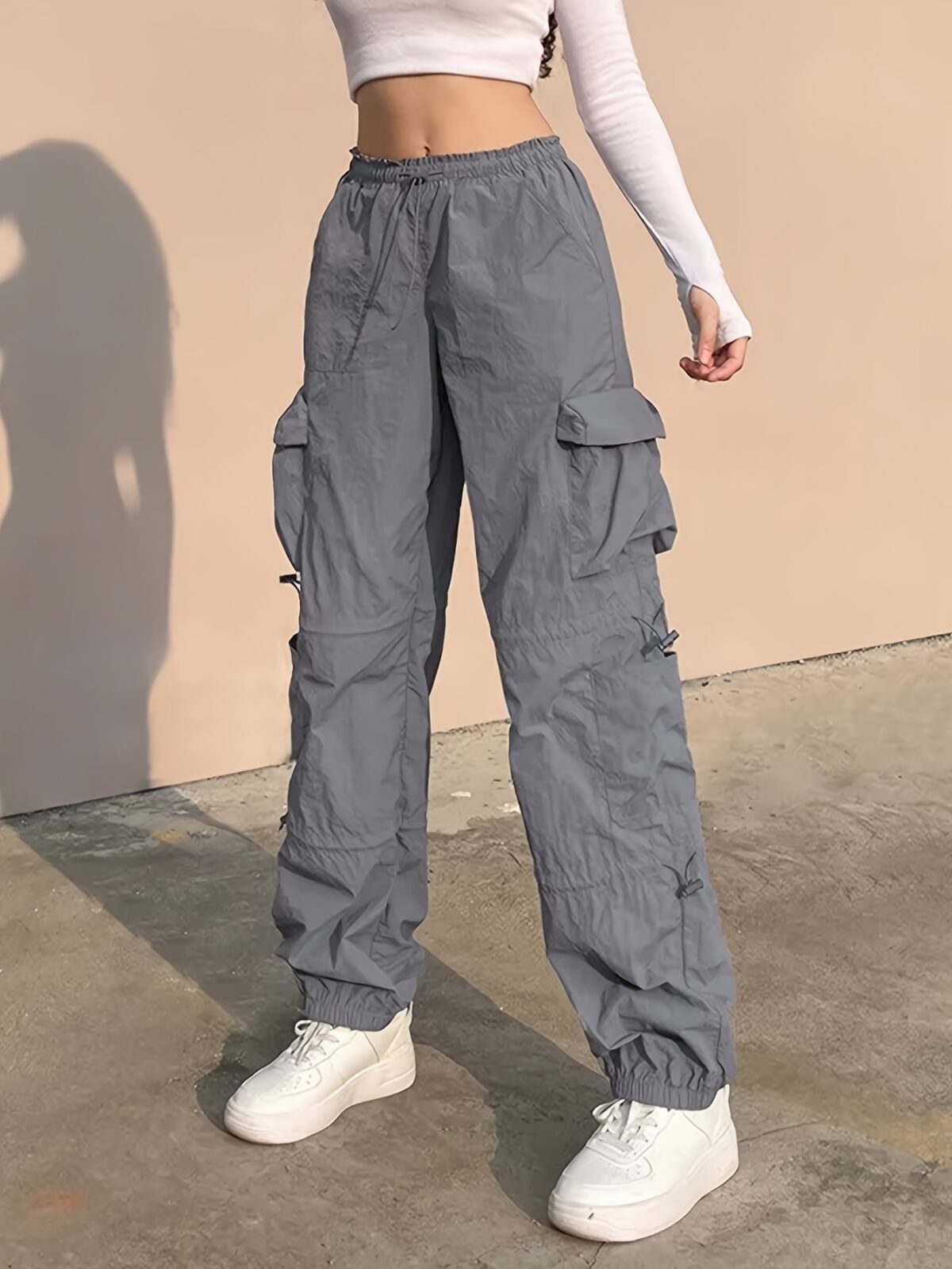 Model wearing stylish baggy NVFelix casual overalls showcasing the comfortable relaxed fit and Y2K inspired design