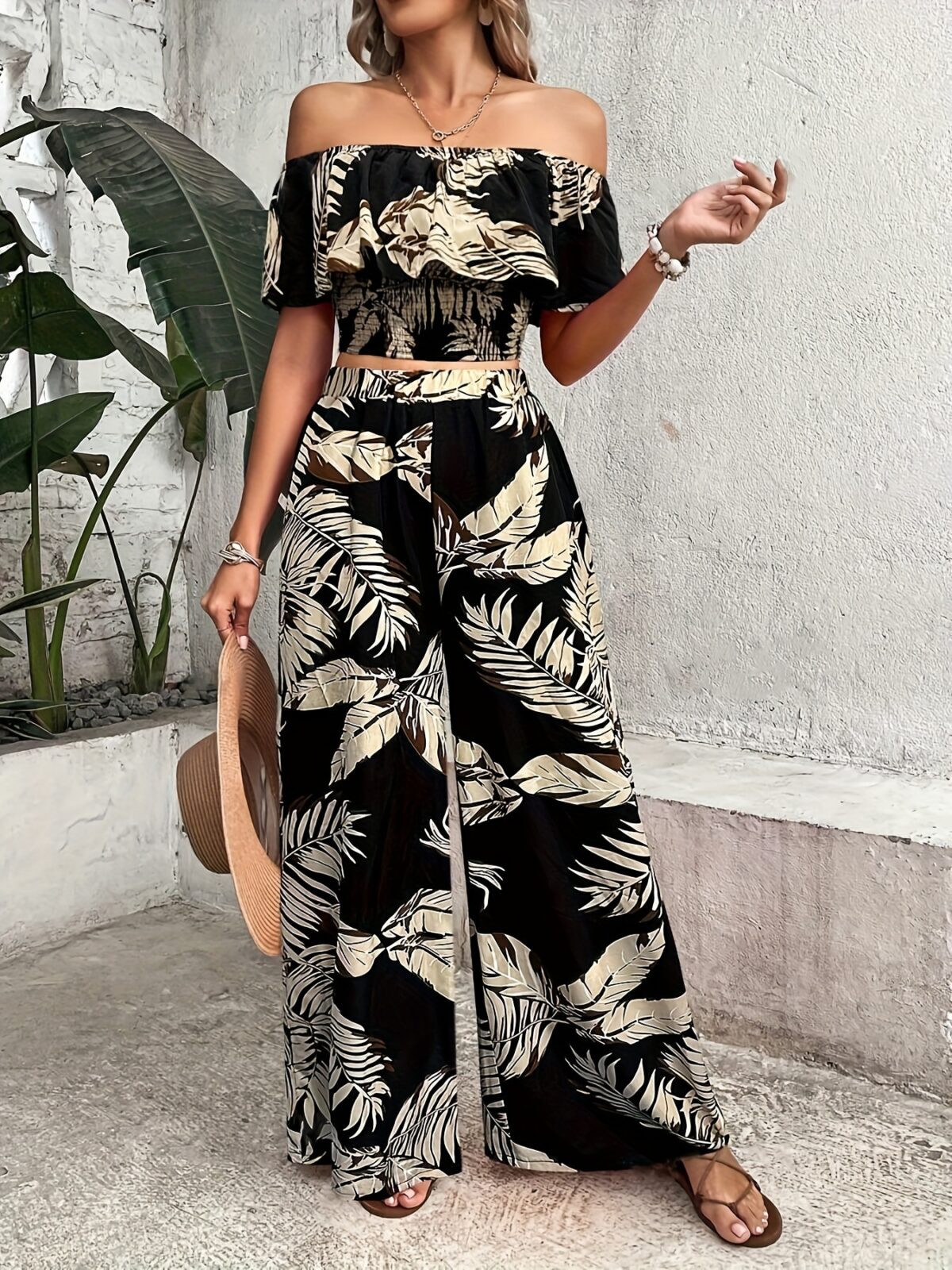 Escape to Paradise Model wearing the Newness Tropical Print Set showcasing its effortless chic style Perfect for summer days and nights