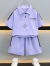 Stylish purple sports set for boys aged 12 and under Breathable polyester fabric ensures comfort and freedom of movement Perfect for summer activities