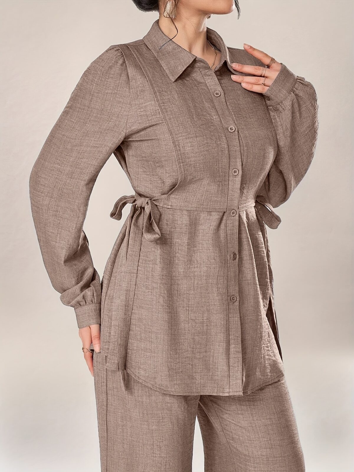 The Cairo Chic Two Piece Set by Newness in luxurious polyester A stylish and comfortable two piece outfit perfect for any occasion
